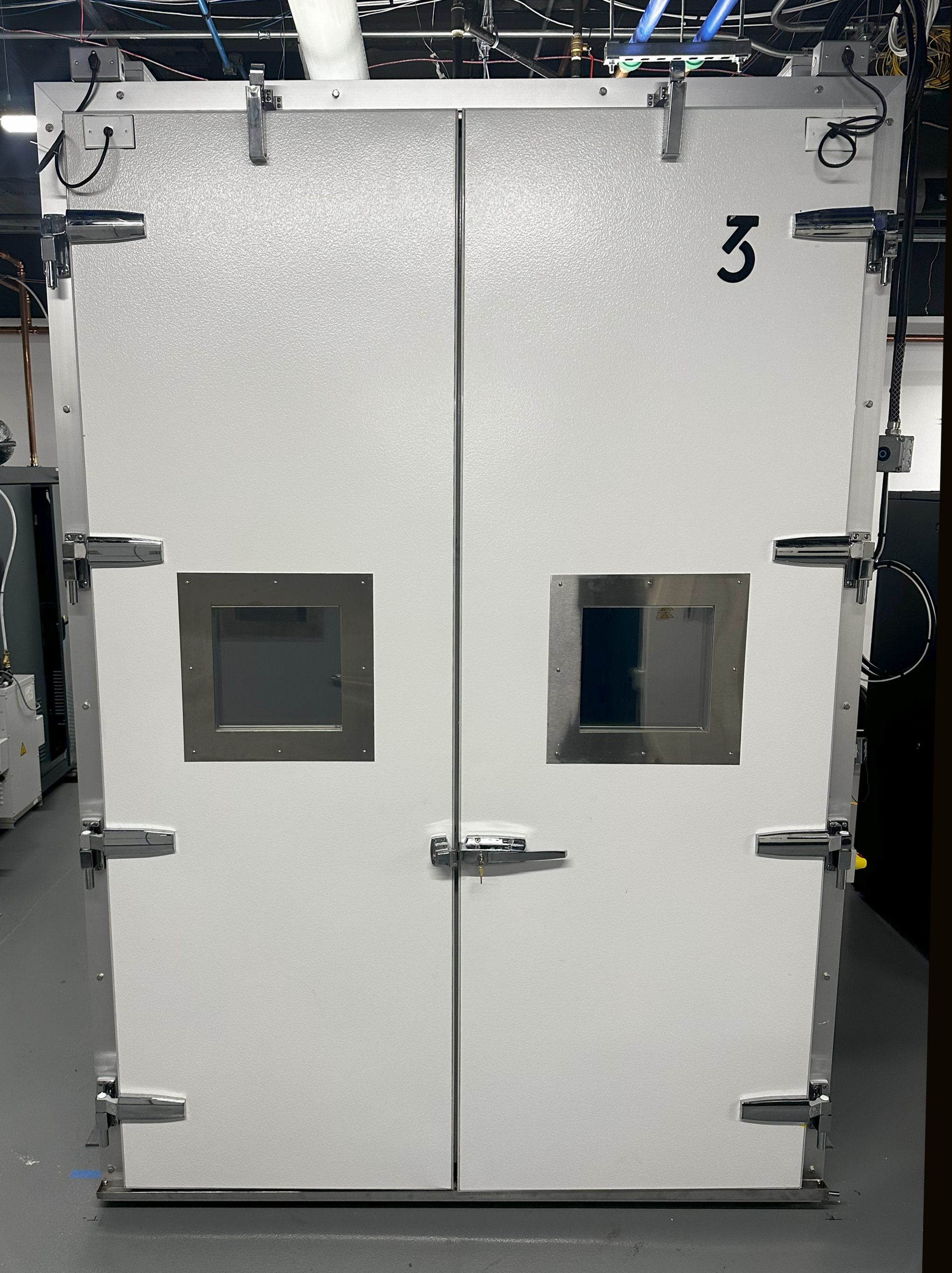 Industrial walk-in environmental test chamber for robotic system validation